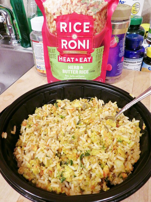 a bowl of Herb & Butter Rice mixed with mashed veggie meatballs